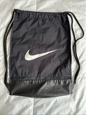 Nike Black Drawstring Backpack with White Swoosh